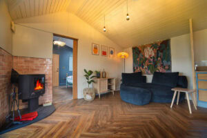 woodstove and stylish sofa